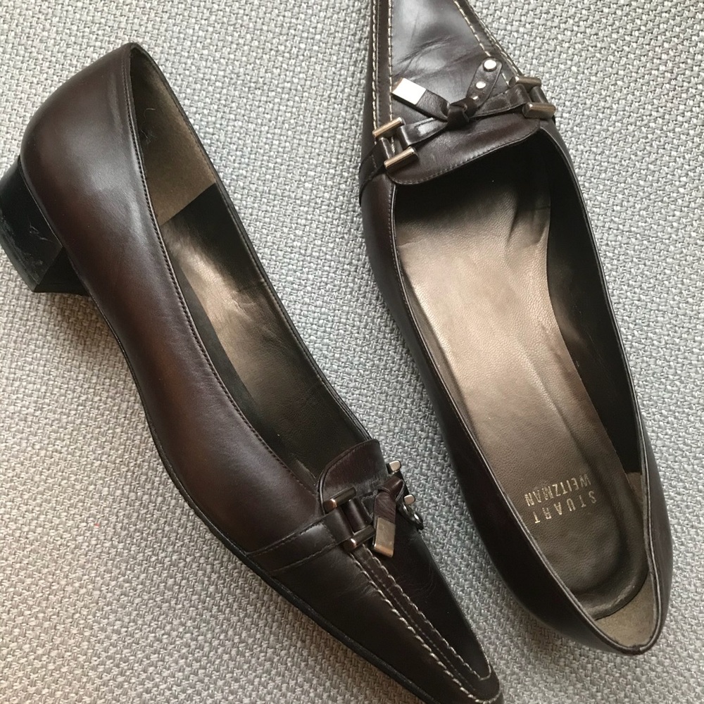 Stuart Weitzman brown leather flats.
